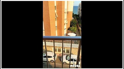 My Wife Is Drying Off On The Balcony In Spain Just After The Beach And Is A Little Shy
