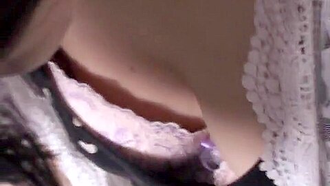 Smooth, pale Japanese tits in this downblouse voyeur video